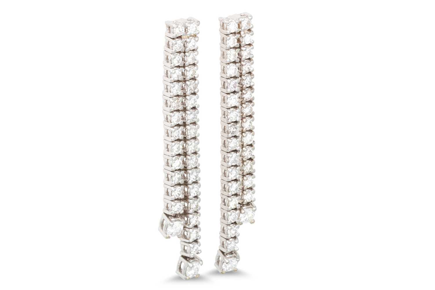 Lot 130 - A PAIR OF DIAMOND DROP EARRINGS, comprising...