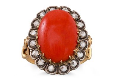Lot 132 - A CORAL AND DIAMOND CLUSTER RING, the cabochon...