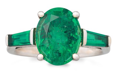 Lot 170 - AN EMERALD RING, the oval emerald to emerald...