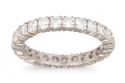 Lot 286 - A DIAMOND ETERNITY RING, set with brilliant...