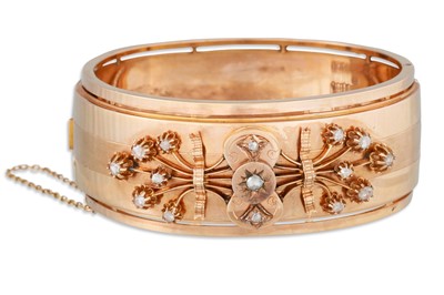 Lot 299 - AN ANTIQUE DIAMOND SET BANGLE, in rose gold...