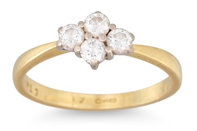 Lot 193 - A DIAMOND FOUR STONE CLUSTER RING, the round...