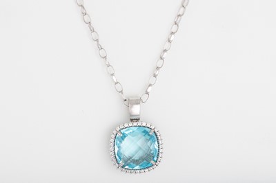 Lot 31 - A TOPAZ AND DIAMOND PENDANT, in 9ct white gold,...