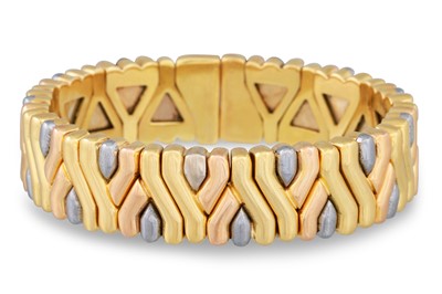 Lot 290 - A VINTAGE BULGARI 18CT GOLD BANGLE, of sprung...