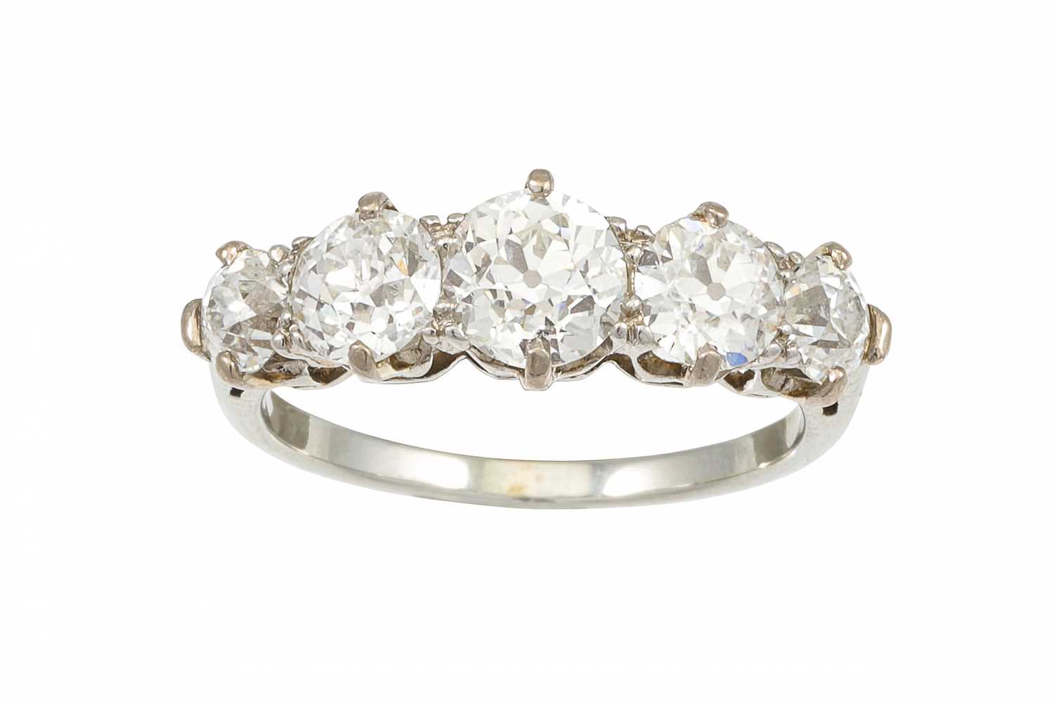 Lot 174 - A FIVE STONE DIAMOND RING, the old cut...