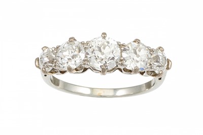 Lot 418 - A FIVE STONE DIAMOND RING, the old cut...