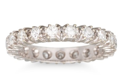 Lot 301 - A DIAMOND ETERNITY RING, the brilliant cut...