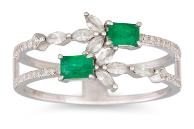 Lot 69 - AN EMERALD AND DIAMOND RING, the two rowed...