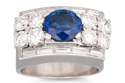 Lot 196 - A SAPPHIRE AND DIAMOND RING, the oval sapphire...