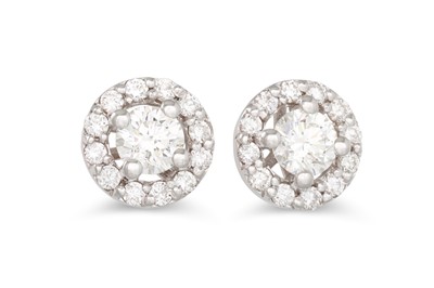 Lot 256 - A PAIR OF DIAMOND HALO CLUSTER EARRINGS, the...