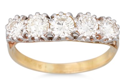 Lot 191 - A FIVE STONE DIAMOND RING, in a carved 18ct...