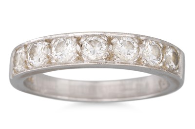 Lot 111 - A DIAMOND HALF ETERNITY RING, the brilliant...