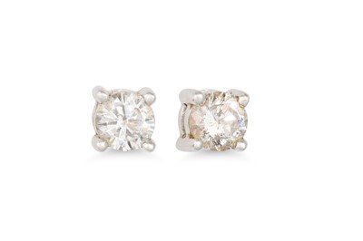 Lot 113 - A PAIR OF DIAMOND STUD EARRINGS, the round...
