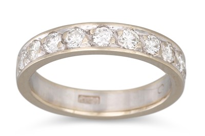 Lot 162 - A DIAMOND HALF ETERNITY RING, the brilliant...