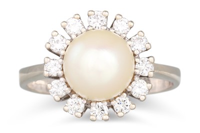 Lot 168 - A PEARL AND DIAMOND CLUSTER RING, the central...