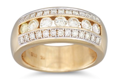 Lot 182 - A DIAMOND THREE ROWED RING, set with yellow...