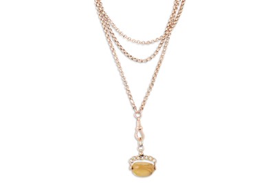 Lot 21 - AN ANTIQUE GOLD MUFF CHAIN, to a citrine...