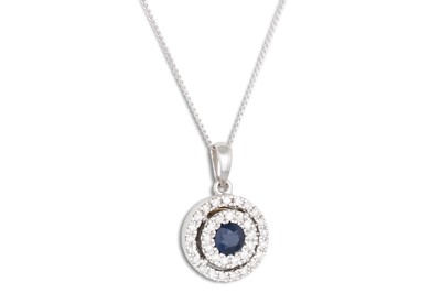 Lot 30 - A DIAMOND AND SAPPHIRE TARGET PENDANT, mounted...