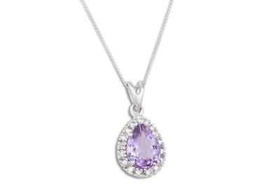 Lot 33 - A DIAMOND AND AMETHYST PENDANT, the pear...