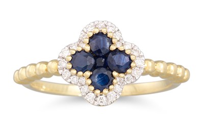 Lot 74 - A DIAMOND AND SAPPHIRE CLUSTER RING, of...