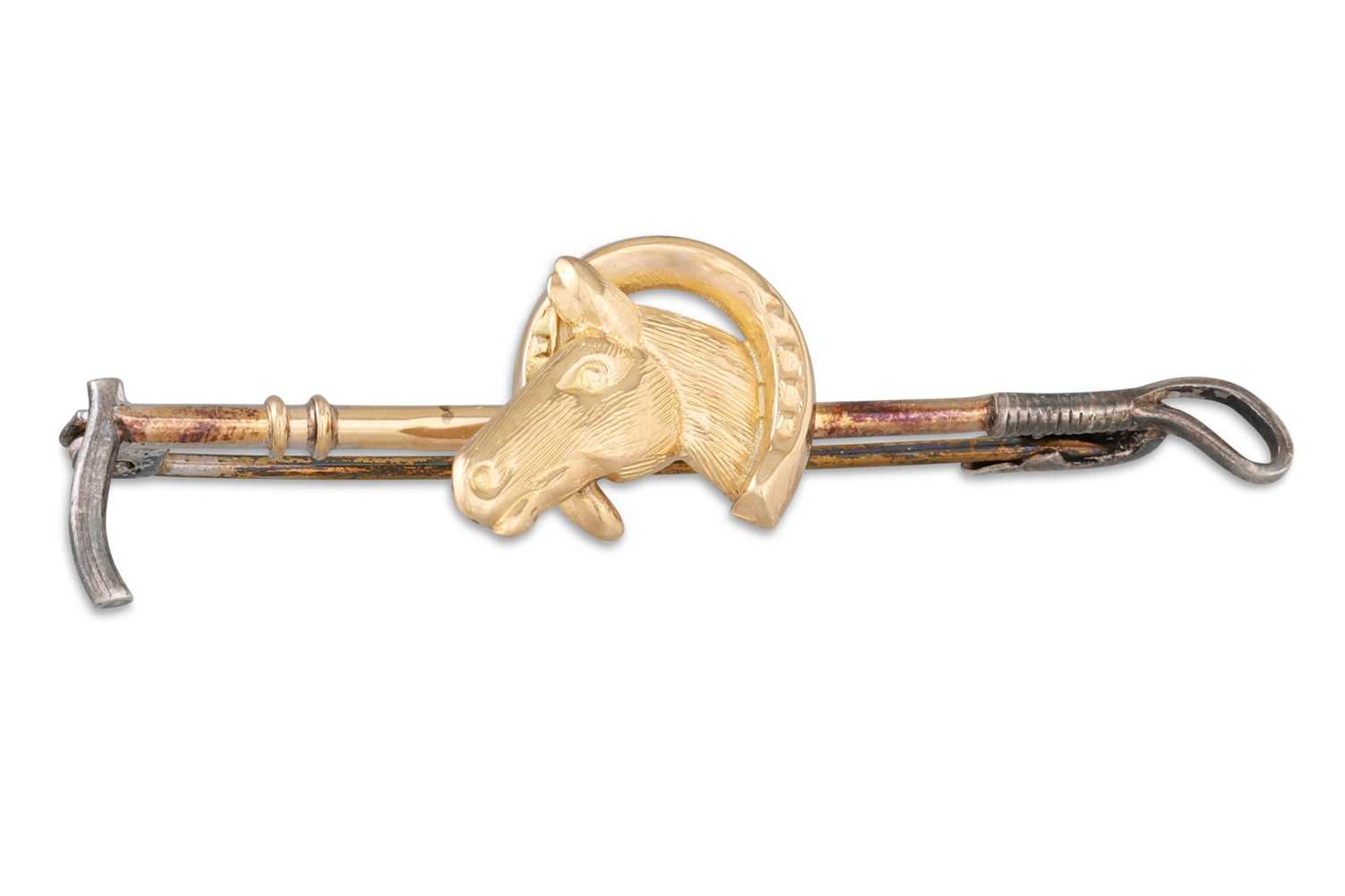 Lot 86 - AN ANTIQUE GOLD HUNTING BROOCH, applied horse...