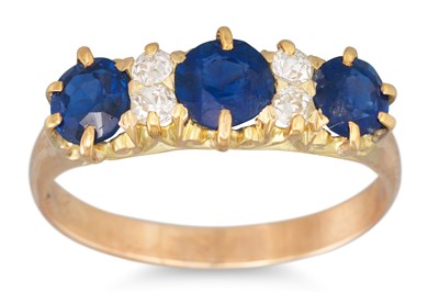 Lot 137 - A DIAMOND AND SAPPHIRE RING, mounted in 18ct...