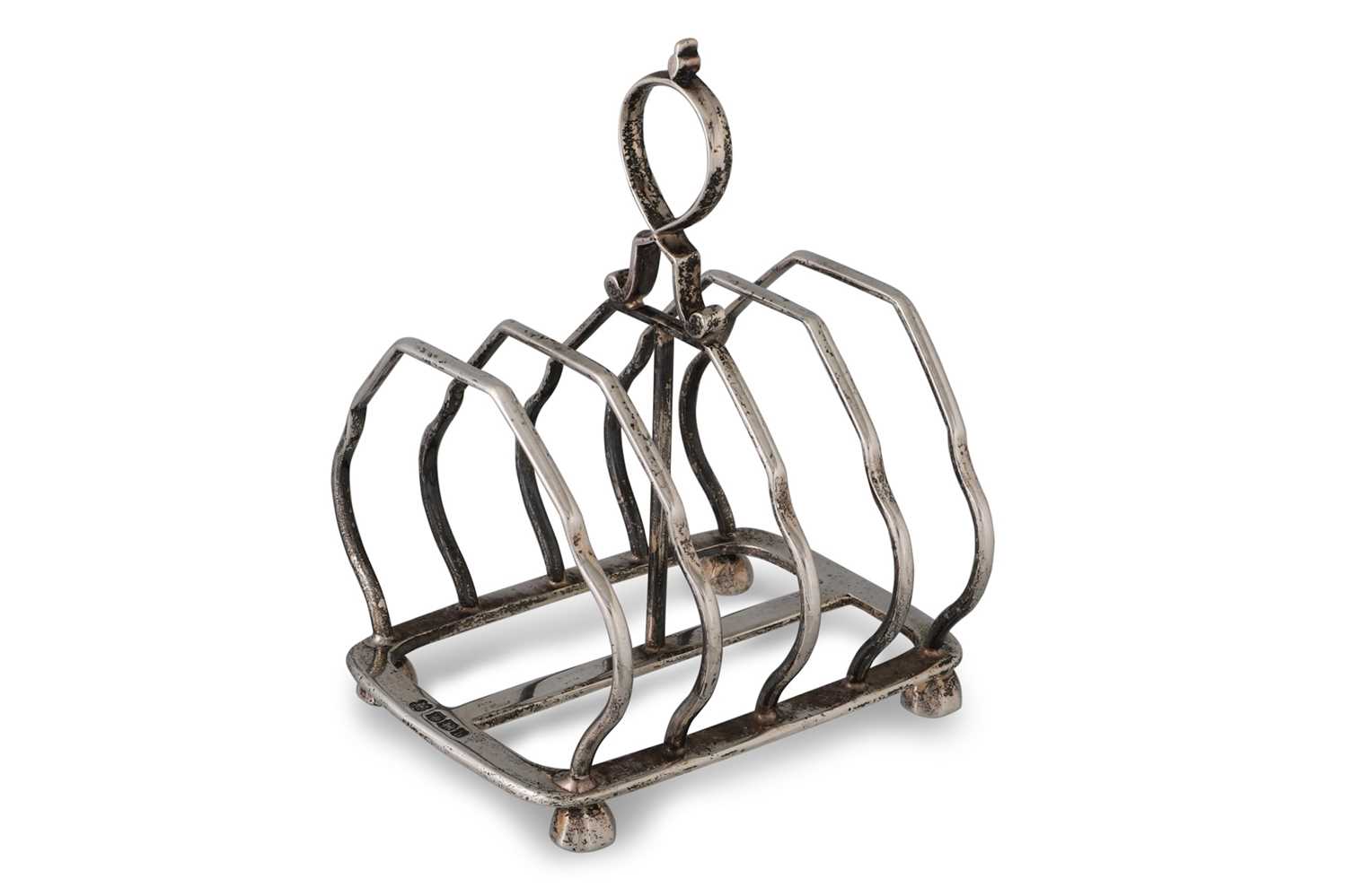 Lot 388 - A GEORGE V FOUR BAR TOAST RACK, by Martin Hall...