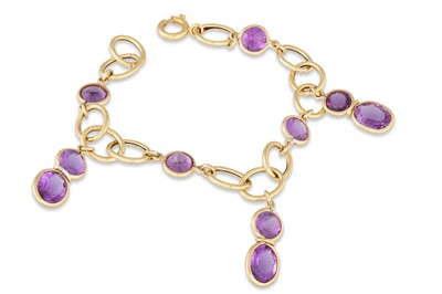 Lot 244 - A GOLD AND AMETHYST BRACELET, the oval links...