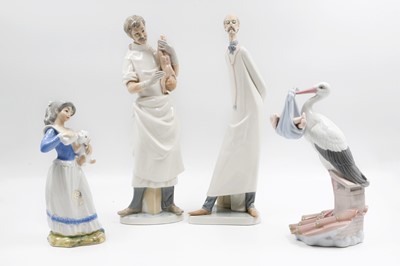 Lot 282 - FOUR FIGURINES, three lladro and another