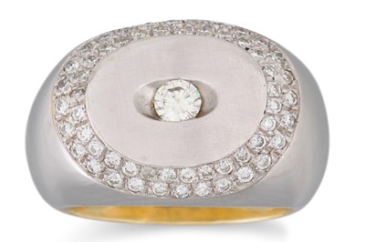 Lot 56 - A DIAMOND RING, of bombé form, the central...
