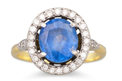 Lot 244 - A SAPPHIRE AND DIAMOND RING, the oval sapphire...