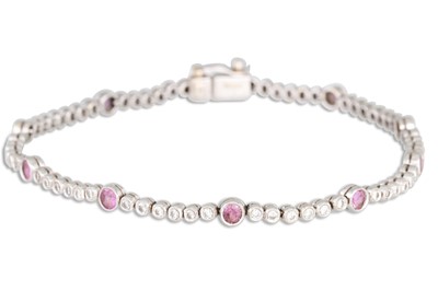 Lot 272 - A PINK SAPPHIRE AND DIAMOND LINE BRACELET,...