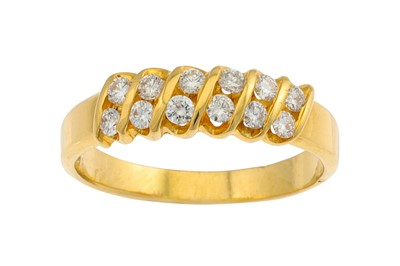 Lot 394 - A DIAMOND RING, set with twelve diamonds,...