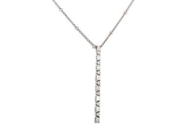 Lot 358 - A DIAMOND SET PENDANT, set with a line of...