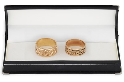 Lot 174 - TWO 9CT GOLD CELTIC BAND RINGS, 12.5 g. Size:...