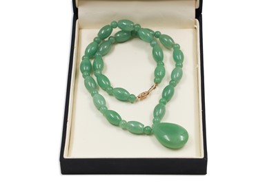 Lot 228 - A JADE NECKLACE, with a 14ct gold clasp