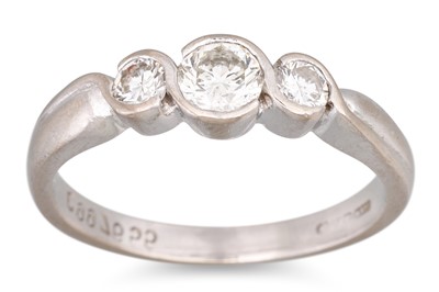 Lot 100 - A THREE STONE DIAMOND RING, mounted in...
