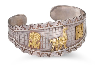 Lot 7 - A PERUVIAN BANGLE, silver with 18ct plated...