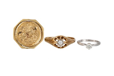 Lot 431 - THREE 9CT GOLD RINGS, two set with a diamond...