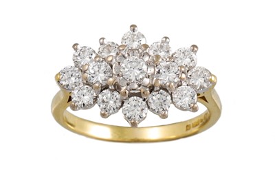 Lot 432 - A DIAMOND CLUSTER RING, mounted in 18ct yellow...