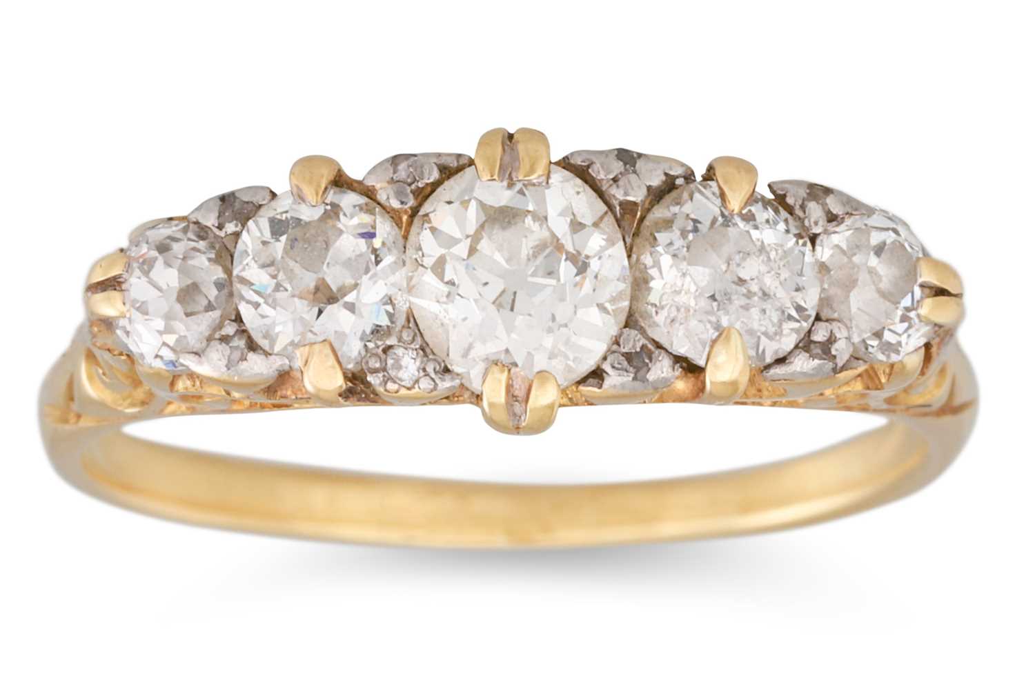 Lot 29 - AN ANTIQUE FIVE STONE RING, the graduated old...