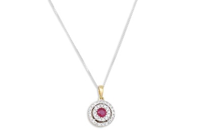 Lot 26 - A DIAMOND AND RUBY TARGET PENDANT, the ruby to...