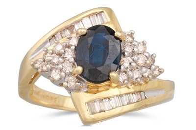 Lot 58 - A DIAMOND AND SAPPHIRE CLUSTER RING, the oval...