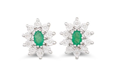 Lot 76 - A PAIR OF DIAMOND AND EMERALD CLUSTER EARRINGS,...