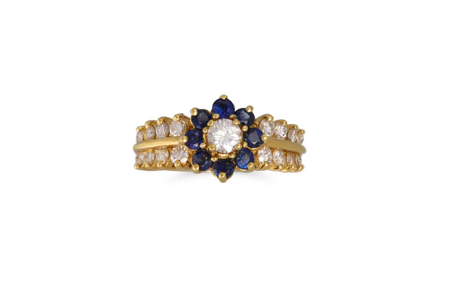 Lot 73 - A DIAMOND AND SAPPHIRE DOUBLE ROW CLUSTER...