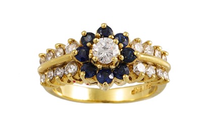 Lot 115 - A DIAMOND AND SAPPHIRE DOUBLE ROW CLUSTER...