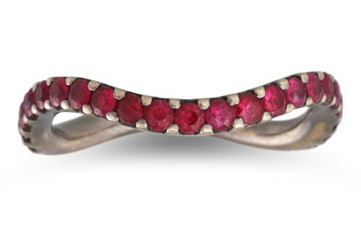Lot 36 - A RUBY ETERNITY RING, of oval wavy design,...