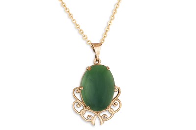 Lot 303 - A JADE PENDANT, mounted in 9ct gold, on a 18ct...