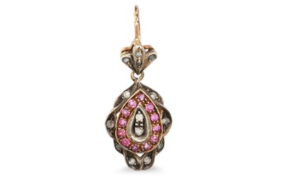 Lot 305 - A VINTAGE DIAMOND AND RUBY PENDANT, mounted in...