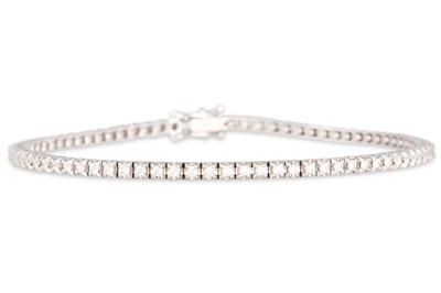 Lot 196 - A DIAMOND LINE BRACELET, mounted in 18ct white...